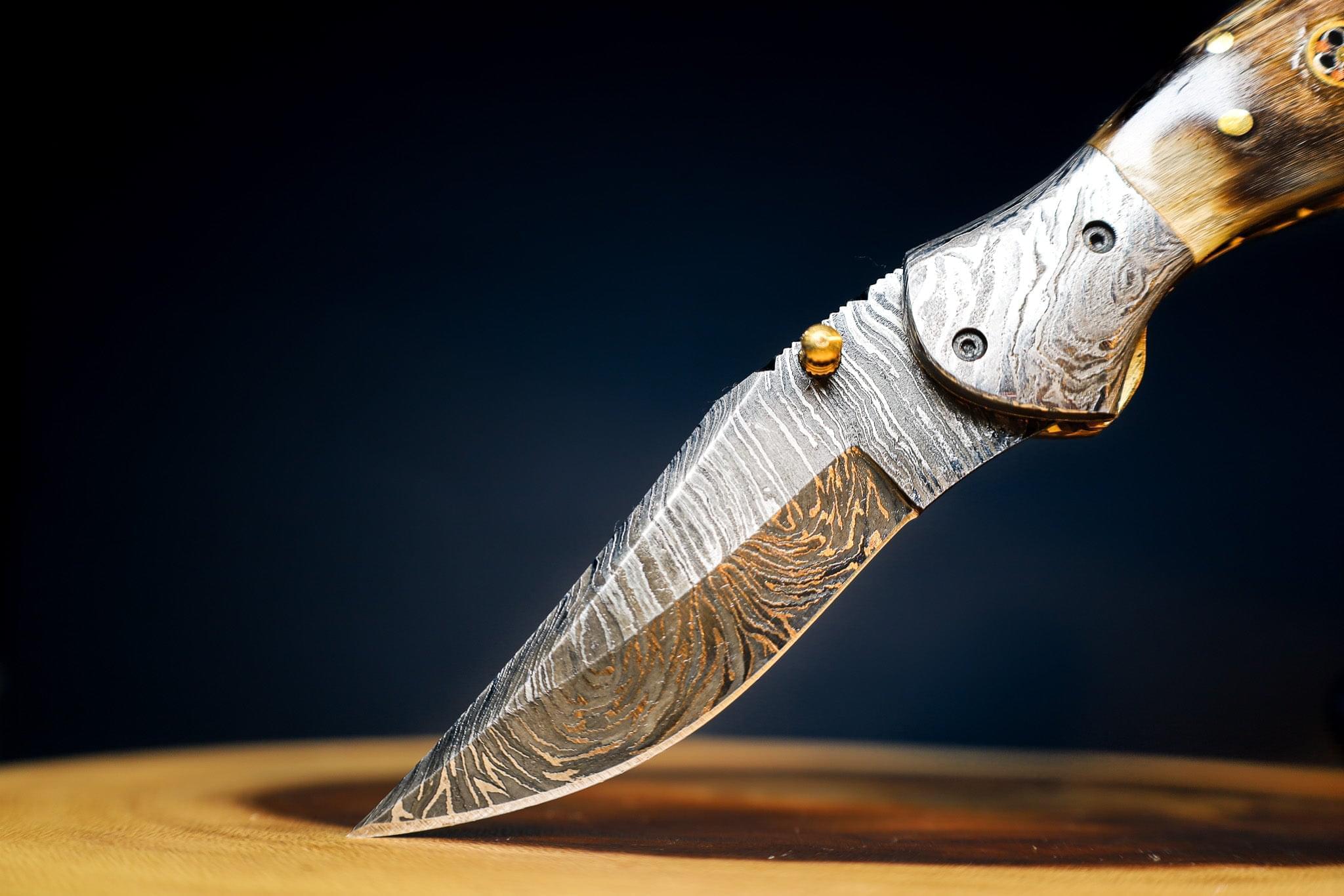 🐏 RAM HORNS IN THE WILD: Damascus Steel EDC Pocket Folding Knife With Leather Sheath by SacredBlade